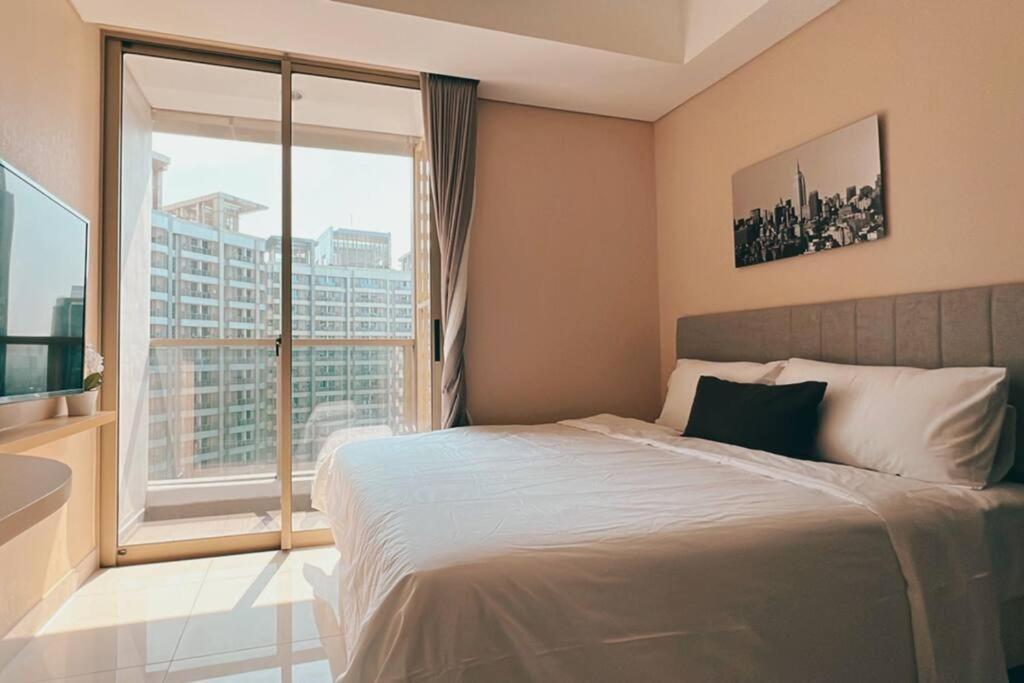 Cozy Studio Suite in Taman Anggrek Residences Jakarta Buitenkant foto